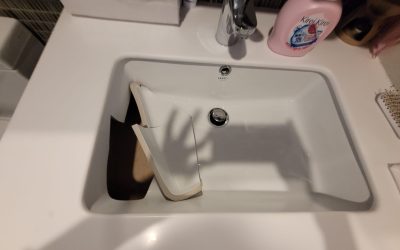 Replacement of cracked undermount basin with countertop basin